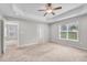 Spacious primary bedroom with a view of two windows at 173 Forsyth Pkwy Pkwy, Clayton, NC 27520