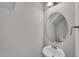 Neat powder room with modern sink, faucet, and mirror at 173 Forsyth Pkwy Pkwy, Clayton, NC 27520