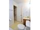 Bathroom featuring toilet, vanity, and open closet at 2006 N Ashland Dr, Burlington, NC 27217