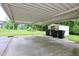 Spacious carport offering ample parking and a storage shed at 2006 N Ashland Dr, Burlington, NC 27217