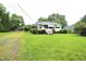 Charming home featuring a well-maintained lawn and inviting front porch at 2006 N Ashland Dr, Burlington, NC 27217