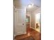 Hallway featuring hardwood floors with views of other areas of the home at 2006 N Ashland Dr, Burlington, NC 27217