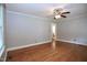 Spacious living room featuring hardwood floors and access to other areas of the home at 2006 N Ashland Dr, Burlington, NC 27217