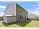 Spacious backyard featuring green grass, a privacy fence, and room to relax outdoors at 228 Botanical Ct, Bunnlevel, NC 28323
