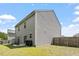 Spacious backyard featuring green grass, a privacy fence, and room to relax outdoors at 228 Botanical Ct, Bunnlevel, NC 28323