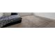 This bedroom features neutral carpet and lots of space at 228 Botanical Ct, Bunnlevel, NC 28323