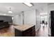 Open living room and kitchen combo. Wood floors throughout at 228 Botanical Ct, Bunnlevel, NC 28323