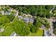 Aerial view of a neighborhood with tree lined streets and well maintained homes at 2805 Van Dyke Ave, Raleigh, NC 27607