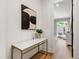 Entryway with marble console table and hardwood floors at 2805 Van Dyke Ave, Raleigh, NC 27607