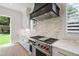 Gourmet kitchen featuring stainless steel appliances, custom cabinetry and sleek countertops at 2805 Van Dyke Ave, Raleigh, NC 27607