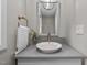 Bathroom features a stylish bowl sink, bronze faucet and towel rack at 3095 Champs Way, Mebane, NC 27302