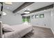Bright bedroom featuring exposed beams, modern windows, and stylish design at 3095 Champs Way, Mebane, NC 27302