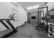 Finished garage space featuring gym equipment and motivational decor, an exercise haven at 3095 Champs Way, Mebane, NC 27302