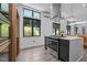 Contemporary kitchen with stainless appliances, island, and modern cabinets at 3095 Champs Way, Mebane, NC 27302