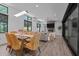 Open concept living and dining space featuring natural light and modern design at 3095 Champs Way, Mebane, NC 27302