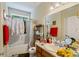 Cozy bathroom with tub/shower, vanity, and good light at 320 Madres Ln, Morrisville, NC 27560