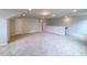 Expansive bonus room featuring plush carpeting, recessed lighting, and neutral color palette at 356 Beacon Hill Rd # 103, Lillington, NC 27546