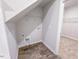 Convenient laundry area with modern flooring and utility connections, adjacent to a storage closet at 356 Beacon Hill Rd # 103, Lillington, NC 27546