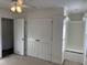 Bedroom with a ceiling fan, closet storage, and a built-in window bench at 395 Wyndham Place Dr, Fuquay Varina, NC 27526