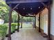 Exterior covered patio with stamped concrete, lighting, and fan at 395 Wyndham Place Dr, Fuquay Varina, NC 27526