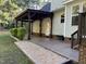 The home's covered patio is perfect for entertaining or relaxing at 395 Wyndham Place Dr, Fuquay Varina, NC 27526