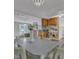 Open dining area with stainless steel appliances, perfect for gatherings and casual meals at 4009 Olde Coach Rd, Durham, NC 27707