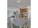 Open concept dining area with kitchen view, perfect for entertaining and Gathering meals at 4009 Olde Coach Rd, Durham, NC 27707