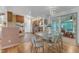 Open concept kitchen features a dining table and chairs at 4009 Olde Coach Rd, Durham, NC 27707