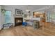 Inviting living room with a cozy fireplace and open floor plan to the kitchen at 4009 Olde Coach Rd, Durham, NC 27707