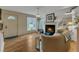 Comfortable living room with fireplace and hardwood floors and bay window at 4009 Olde Coach Rd, Durham, NC 27707