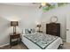Comfortable bedroom with stylish decor, side tables, and a bright window at 4645 Edwards Mill Rd, Raleigh, NC 27612