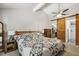 Spacious bedroom featuring a barn door to the bathroom and closet space at 4645 Edwards Mill Rd, Raleigh, NC 27612