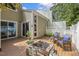 Outdoor patio with brick firepit at 4645 Edwards Mill Rd, Raleigh, NC 27612