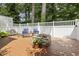 Outdoor patio with seating area and fire pit at 4645 Edwards Mill Rd, Raleigh, NC 27612