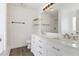 Bright bathroom with dual sink vanity, spacious countertop, and updated fixtures at 4905 Knightsbridge Way, Raleigh, NC 27604