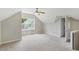 Neutral-toned bedroom with wall air conditioner, carpet floors, ceiling fan, and a window at 4905 Knightsbridge Way, Raleigh, NC 27604