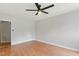 Empty bedroom with hardwood floors and neutral wall color at 4905 Knightsbridge Way, Raleigh, NC 27604