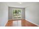 Bright bedroom with a large window overlooking the street at 4905 Knightsbridge Way, Raleigh, NC 27604