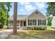 Charming single Gathering home with a cozy front porch and well-maintained landscaping at 4905 Knightsbridge Way, Raleigh, NC 27604
