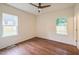 Bright bedroom features attractive wood flooring and great natural light from the two windows at 507 N Elm St, Durham, NC 27701
