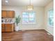 Dining area with natural light and hardwood floors at 507 N Elm St, Durham, NC 27701