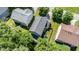 Aerial view of houses with gray shingles and leafy trees, showcasing property lines and neighborhood setting at 6 Beaver Creek Lane Ln, Durham, NC 27703
