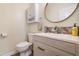 Half bath features a modern vanity, stylish mirror, and updated fixtures at 6 Beaver Creek Lane Ln, Durham, NC 27703