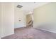 Bedroom with neutral walls and carpet, showcasing a double door closet at 6 Beaver Creek Lane Ln, Durham, NC 27703