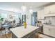 Modern kitchen features a large island, stainless steel appliances and an open floor plan at 647 N Hardee St, Durham, NC 27703