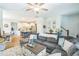 Spacious living room with a large sectional, leading into an open kitchen and dining area at 647 N Hardee St, Durham, NC 27703