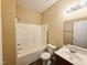 Bathroom with a vanity, toilet, and bathtub, featuring tiled floors and neutral walls at 650 Ganyard Farm Way # 41, Durham, NC 27703
