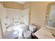 Bathroom with tub and shower combo and tile floors at 650 Ganyard Farm Way # 41, Durham, NC 27703