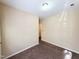 Bedroom with neutral walls and carpeted floors, with views to the hallway at 650 Ganyard Farm Way # 41, Durham, NC 27703