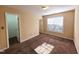 Bright bedroom with natural light from the window, showcasing a pleasant living space at 650 Ganyard Farm Way # 41, Durham, NC 27703